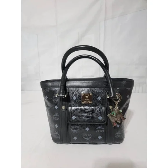 Authentic MCM Small Visetos Coated Canvas and Leather Pocket Tote Black - Picture 4 of 13